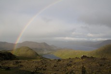 Nordkap, Hurtigruten und Lofoten: Regenbogen über der Nordkapinsel